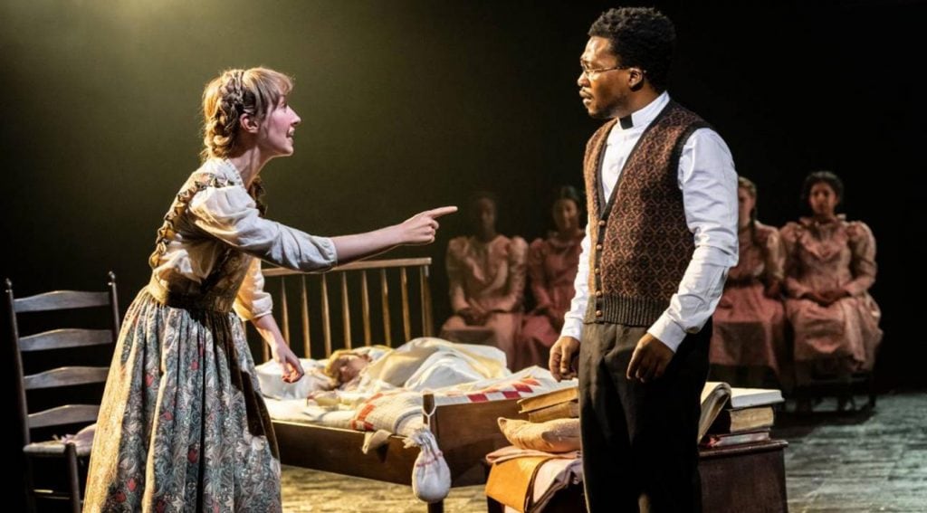 Erin-Doherty-and-Fisayo-Akinade-in-the-Crucible-at-the-National-Theatre